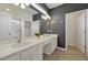 Clean and spacious bathroom with double sinks and walk-in shower at 4429 Ganesha Loop, Kissimmee, FL 34746