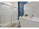 Modern bathroom featuring a glass-enclosed shower and vanity at 4429 Ganesha Loop, Kissimmee, FL 34746