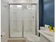 Modern bathroom featuring a glass-enclosed shower, sleek fixtures, and a contemporary vanity at 4429 Ganesha Loop, Kissimmee, FL 34746