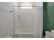 Clean bathroom with white tiles and shower at 4429 Ganesha Loop, Kissimmee, FL 34746