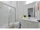 Clean bathroom featuring a glass-enclosed shower and modern fixtures for a comfortable experience at 4429 Ganesha Loop, Kissimmee, FL 34746