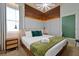 Stylish bedroom with modern decor, a comfortable bed, and plenty of natural light from the windows at 4429 Ganesha Loop, Kissimmee, FL 34746