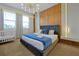 Charming bedroom featuring wood accents, soft lighting, and a comfortable bed at 4429 Ganesha Loop, Kissimmee, FL 34746