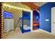 Themed bunk room with TV, white dresser, and playful wall art at 4429 Ganesha Loop, Kissimmee, FL 34746