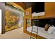 Themed bedroom featuring custom bunk beds and dinosaur themed wall graphics at 4429 Ganesha Loop, Kissimmee, FL 34746