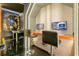 This gaming area features comfortable seating, multiple screens and unique lighting for an immersive experience at 4429 Ganesha Loop, Kissimmee, FL 34746