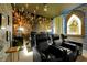 Home theater room with comfortable seating, cinematic projection and themed decorations at 4429 Ganesha Loop, Kissimmee, FL 34746