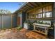 Landscaped yard with gardening area and quaint architectural details providing a welcoming outdoor space at 524 S Lakeview Ave, Winter Garden, FL 34787