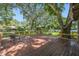 A wooden deck featuring chairs and a serene view of the yard at 524 S Lakeview Ave, Winter Garden, FL 34787
