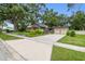 Charming single-Gathering home with a well-manicured lawn, mature trees and detached two car garage at 524 S Lakeview Ave, Winter Garden, FL 34787
