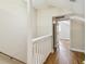 Bright hallway featuring a staircase, natural light, and access to additional rooms at 524 S Lakeview Ave, Winter Garden, FL 34787