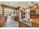 Modern kitchen with stainless steel appliances, custom cabinetry, and a stylish backsplash at 524 S Lakeview Ave, Winter Garden, FL 34787