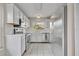 Updated kitchen with stainless steel appliances and white subway tile backsplash at 557 Hunter Cir, Kissimmee, FL 34758