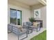 This covered patio offers comfortable seating and outdoor living space at 5909 Cliffbow Loop, Leesburg, FL 34748