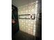 Upgraded shower featuring decorative tiles and a built-in niche, adding a touch of elegance at 63 Lake Wood Cir, Ocala, FL 34482