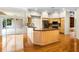 Open kitchen featuring granite countertops and stainless steel appliances at 707 Heritage Ne Dr, Winter Haven, FL 33881