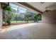 Large, covered patio providing an ideal outdoor living space, perfect for entertaining or relaxing at 707 Heritage Ne Dr, Winter Haven, FL 33881