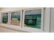 Coastal decor with framed pier artwork and a modern white frame at 7220 Westpointe Blvd # 1429, Orlando, FL 32835
