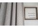 Stylish decor featuring a textured curtain and a 'thankful, grateful, blessed' sign at 7220 Westpointe Blvd # 1429, Orlando, FL 32835