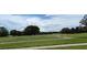 Manicured golf course with lush greenery, ideal for outdoor recreation and scenic views at 7220 Westpointe Blvd # 1429, Orlando, FL 32835