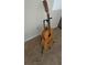 Acoustic guitar on a stand at 7220 Westpointe Blvd # 1429, Orlando, FL 32835