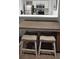 Kitchen area with breakfast bar, seating, stainless steel appliances, and light wood cabinetry at 7220 Westpointe Blvd # 1429, Orlando, FL 32835