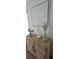 Stylish sideboard with decor and starfish artwork at 7220 Westpointe Blvd # 1429, Orlando, FL 32835