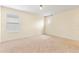 Bright and spacious bedroom with large windows and neutral decor at 7409 Fairgrove Ave, Windermere, FL 34786