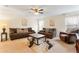 Inviting living room with comfortable seating, soft lighting, and neutral tones at 7409 Fairgrove Ave, Windermere, FL 34786