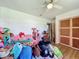 Bedroom with wood flooring, showing a bed and closet at 91 High St, Winter Haven, FL 33880