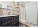 Updated bathroom with modern vanity, gold fixtures, and glass shower at 941 Grey Oak Ct, Orlando, FL 32809