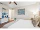 Cozy bedroom with wood-look flooring, natural light, and soothing decor at 941 Grey Oak Ct, Orlando, FL 32809