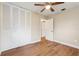 Bedroom with laminate floors, ceiling fan, and closet at 941 Grey Oak Ct, Orlando, FL 32809