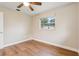 Bedroom featuring hardwood floors and a ceiling fan at 941 Grey Oak Ct, Orlando, FL 32809