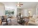 Open-concept living area with seamless access to the dining space at 941 Grey Oak Ct, Orlando, FL 32809