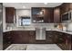 Well-equipped kitchen featuring stainless steel appliances, ample counter space, and sleek cabinetry at 4318 Waterfront Pkwy, Orlando, FL 32806