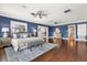 Serene main bedroom features a cozy seating area and stunning waterfront views for relaxation at 4318 Waterfront Pkwy, Orlando, FL 32806