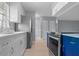 Modern kitchen featuring stainless steel appliances, quartz countertops, and a stylish island at 1066 Swanson Dr, Deltona, FL 32738