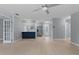 Open concept living space shows kitchen, living, and dining space at 1066 Swanson Dr, Deltona, FL 32738