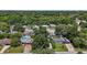 Discover this property from above, nestled among mature trees in a peaceful neighborhood setting at 116 E Lauren Ct, Fern Park, FL 32730