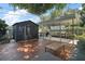 Backyard deck featuring a shed, carport, grill, and outdoor seating at 116 E Lauren Ct, Fern Park, FL 32730