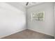 This room features a window for natural light and neutral carpeting at 116 E Lauren Ct, Fern Park, FL 32730