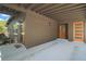 Outdoor area with covered parking, featuring two exterior doors and recessed lighting at 116 E Lauren Ct, Fern Park, FL 32730
