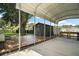 Relaxing covered patio featuring a wooden deck and outdoor furniture, perfect for enjoying the backyard at 116 E Lauren Ct, Fern Park, FL 32730