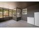 Enclosed patio with a view of the backyard and extra freezer storage at 116 E Lauren Ct, Fern Park, FL 32730