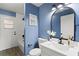 Renovated bathroom with modern fixtures, stylish accents, and a shower with beautiful tile at 1161 Roxboro Rd, Longwood, FL 32750