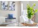 Close up of a vase of greenery on a coffee table in a sunlit, spacious living room, soft decor accents at 1161 Roxboro Rd, Longwood, FL 32750