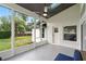 Charming screened patio overlooking the lush backyard with beautiful views at 1161 Roxboro Rd, Longwood, FL 32750