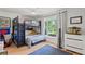 bedroom with a bunk bed and plenty of natural light from the large window at 1191 Banbury Trl, Maitland, FL 32751