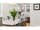 Bright dining room featuring a marble-top table, metal chairs and view to the office at 1191 Banbury Trl, Maitland, FL 32751